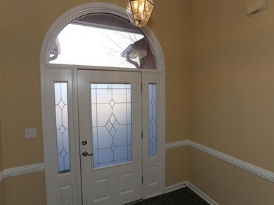 Foyer features  leaded glass door and side light p