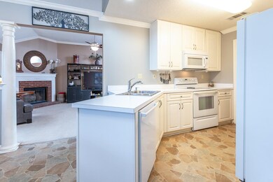 Opens to Great Room, Dining Room and Breakfast Roo