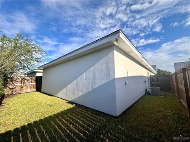 View of home's exterior featuring a fenced backyard and stucco siding