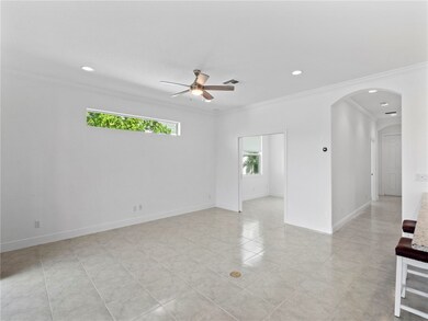 Opposite side of living room, view into 3rd bedroo