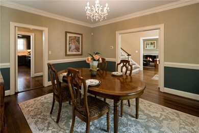 Dining Room with crystal chandelier and pocket doo