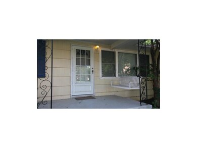 Quaint front porch, with swing