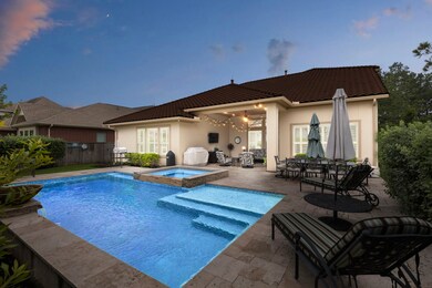 Large pool with huge spa with waterfall and fire b