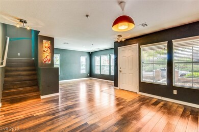 Great room view with multiple furniture arrangemen