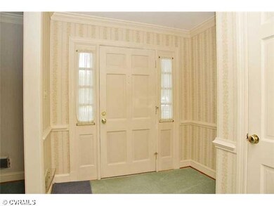 Foyer - Interior entry/exit with chair rails.