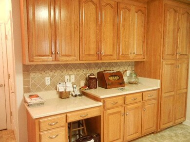 A very versatile space is the desk area perfect for storing recipes, doing homework, or paying the monthly bills.