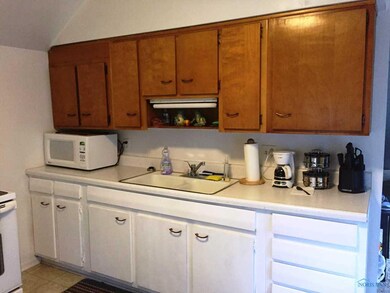 Kitchen. Upstairs
