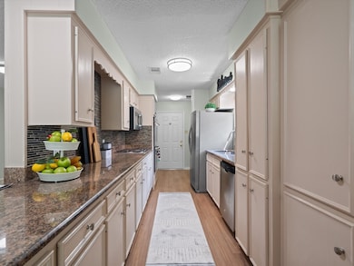 The kitchen is a delight, with loads of cabinetry