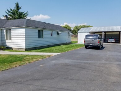 Home with extra parking and carport