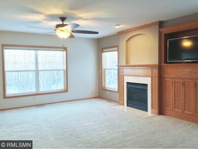 Family room looks to the spacious rear yard. There
