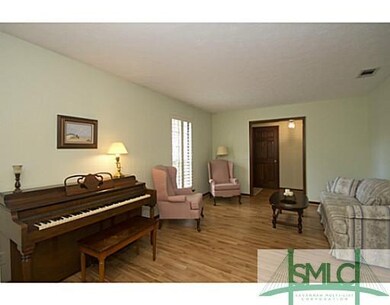 Living Room. view 2 Featuring wood floors!