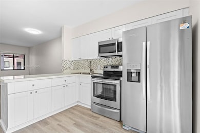 Aalmeda Towers unit 104, Hialeah, FL 33016 - photo 3