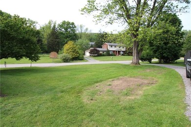 Backyard With Driveway Access To Side Street