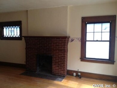Exterior Front. Both apartments have woodburning f