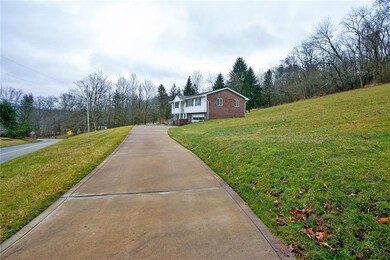 The long driveway is gently sloping and will accom