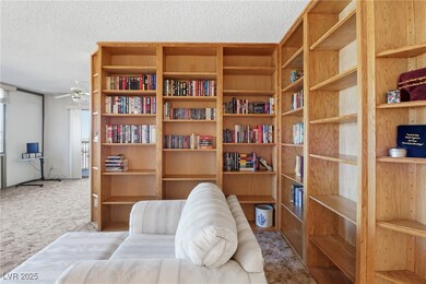 Living room space featuring a built-in bookcase
