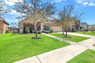 Upgraded Exterior elevation of brick and stone. Professionally landscaped front, back and side yards.