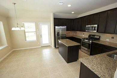 Tile and wood floors downstairs in the living area