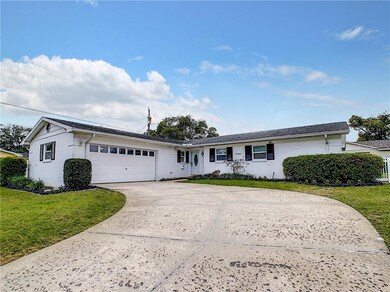 Front of home with parking for six in the driveway!