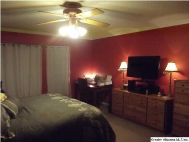 Romantic red master bedroom.