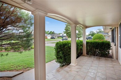 Lovely front porch for visiting with your neighbor
