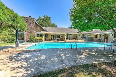 Large covered patio.  Pool house / guest house.  M