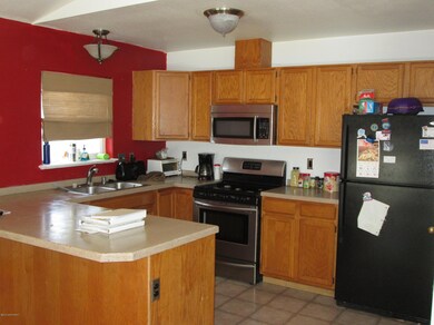 Kitchen with newer appliances.