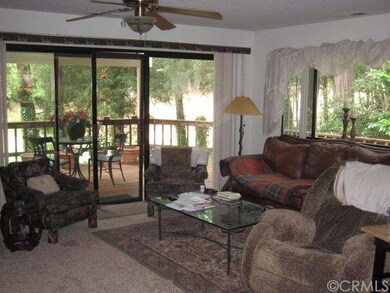 Great room looking out onto covered patio
