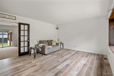 Unfurnished room with ceiling fan, french doors, a