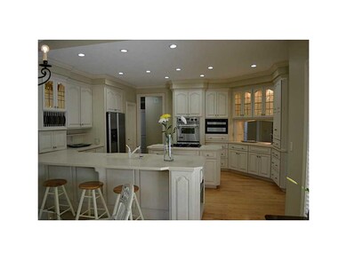 Kitchen. Double stainless ovens, large walk in pan