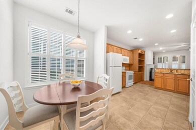Dining space featuring recessed lighting