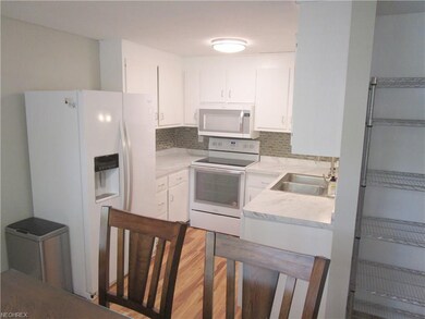 Newer appliances and counters create an updated lo
