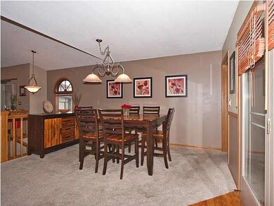 Dining Area (Plus Breakfast Bar) Opens to Beautifu