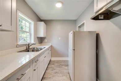 Crisp and clean with fresh paint and bright lighting.