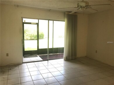 Living Room has tile floors, access to the screen 