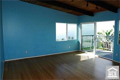 Living room opens onto large view deck.