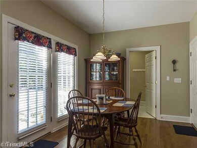 Breakfast. Breakfast area opens to deck.  Laundry room. Door to garage. Hardwood floors throughout first floor except master bedroom.