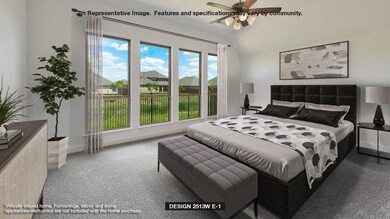 Carpeted bedroom featuring lofted ceiling and bas