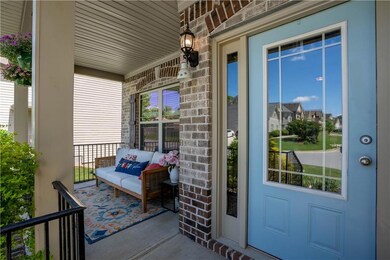 Entrance to property featuring brick siding and co