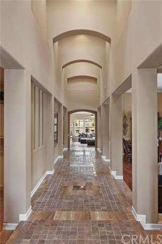 Dramatic 40 foot marble and limestone entry hallwa