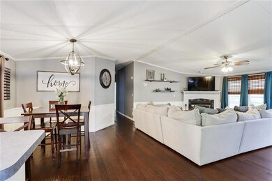 Open concept kitchen dining and living, wood burni