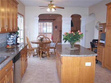 Kitchen also has tiled backsplash