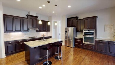 Massive kitchen with SS appliances.