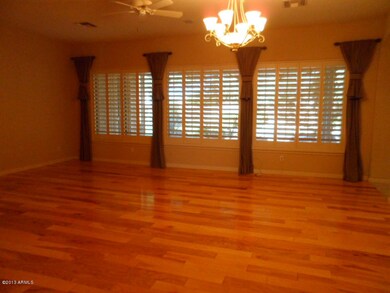 HUGE LIVING ROOM W/ WOOD FLOORING,SHUTTE