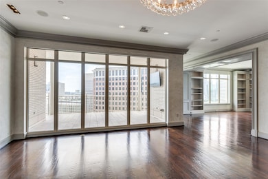 Spare room featuring dark hardwood / wood-style fl