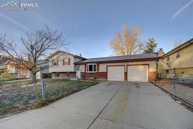 Tri-level home featuring a garage