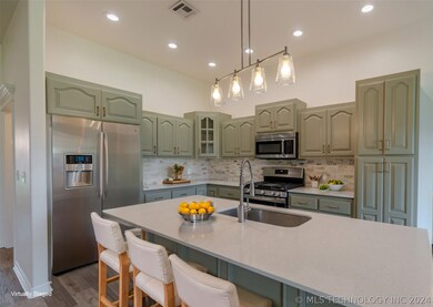 Updated Kitchen w trending kitchen cabinet color,