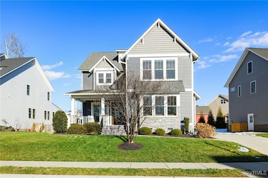 Front of property featuring covered porch and a fr