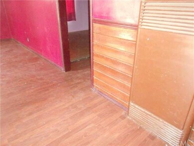 Living room wood laminate flooring. Wall heating. 