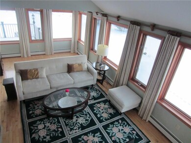 Spacious living room with sunset...